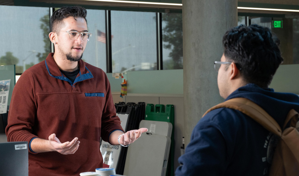 Staff speaking to student