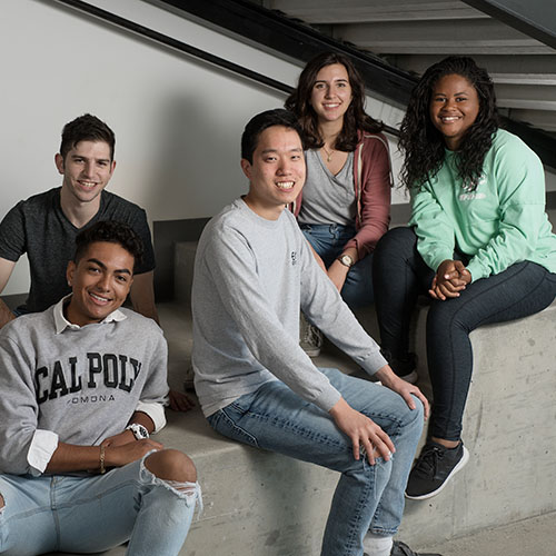 students sitting an a bench