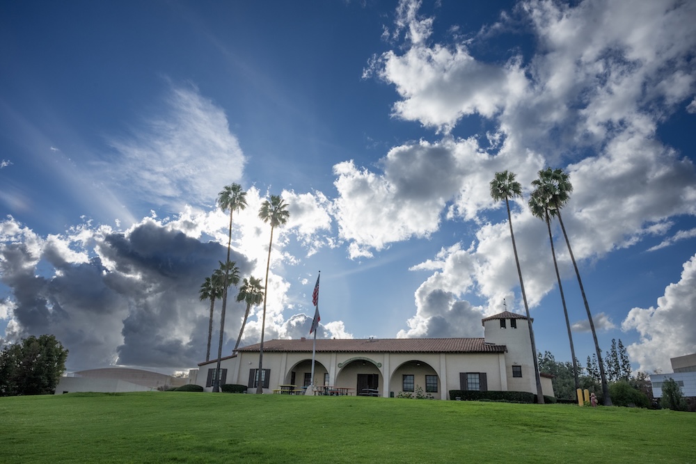 The University stables with clouds