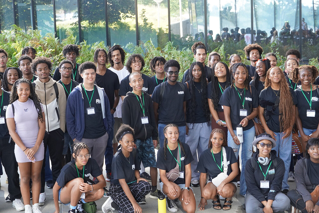A group of RISE students touring campus pose for a photo at the SSB