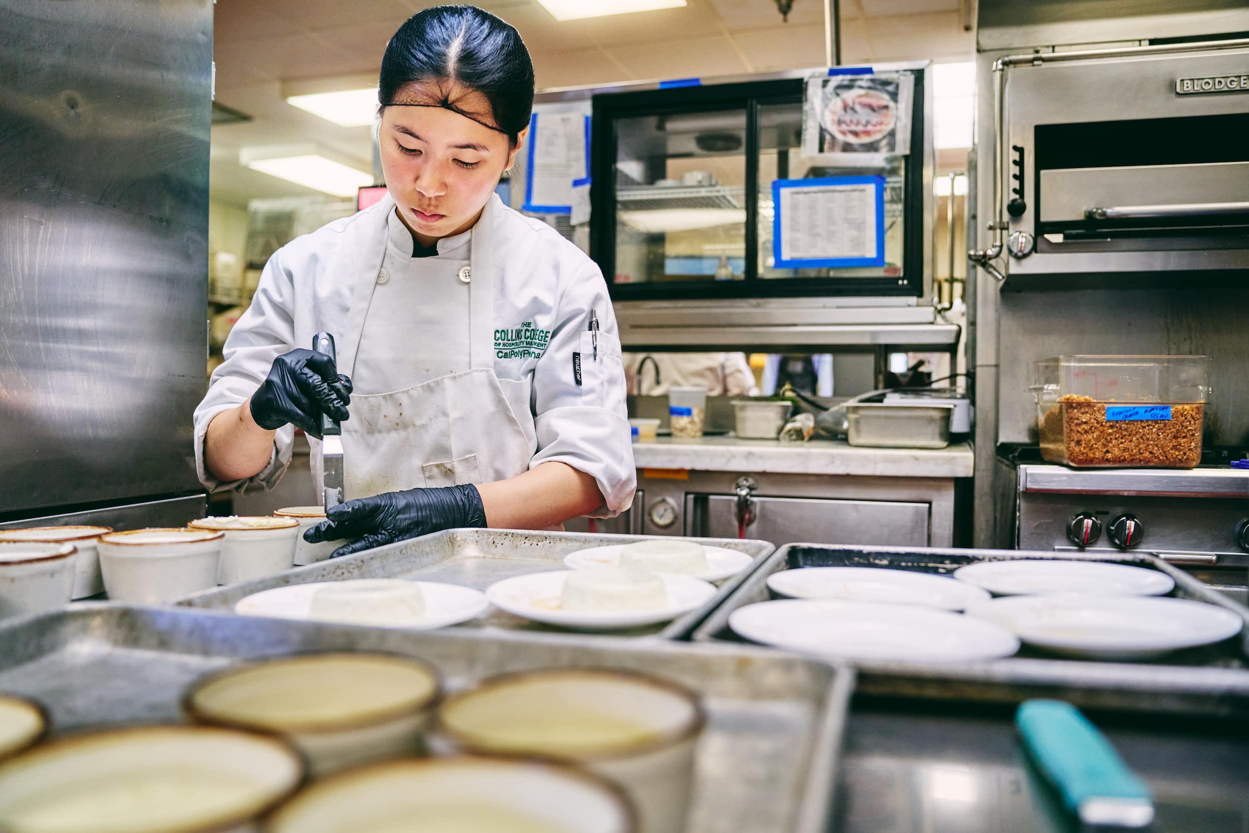 Student chef working in the kitchen at the RKR.