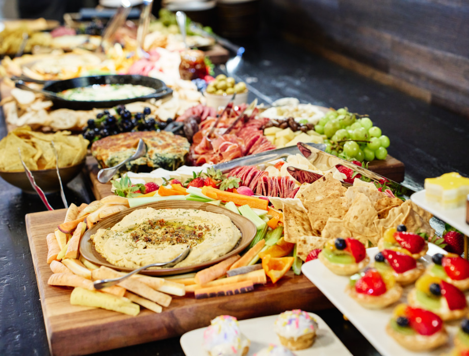 Appetizer spread on a wooden table.