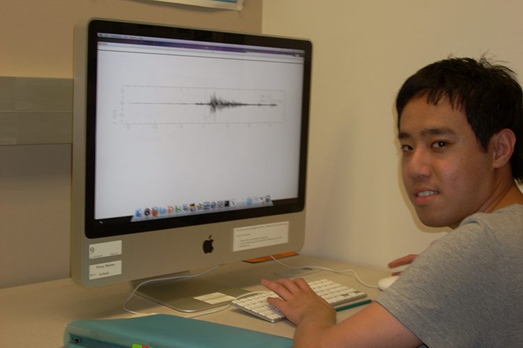 students in front of a computer looking at seismogram