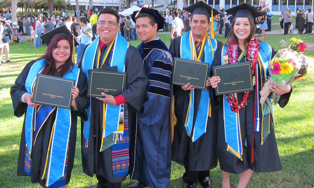 LSAMP graduates in cap and gown