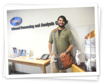 Mario standing in the entrance of ipac at Caltech.