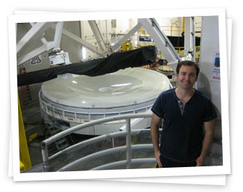 Remington standing in front of the primary 6.5-m LSST