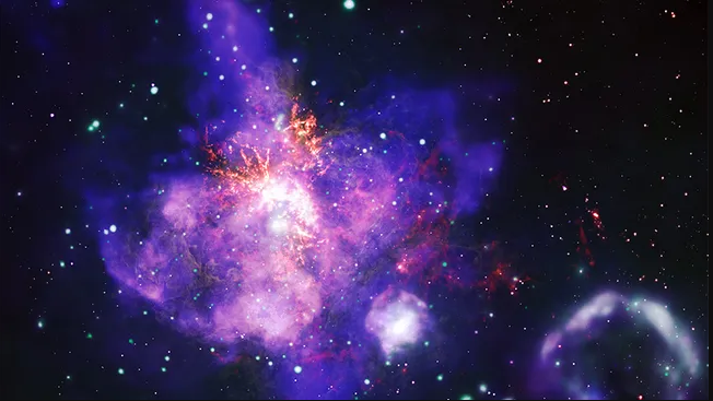 Visual of the 30 Doradus Bouquet. The X-ray wind and gas take takes the shape of a massive purple and pink bouquet with an extended central flower. It is surrounded by glowing dots of green, white, orange, 