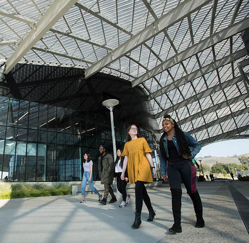 Students walking through the Student Services Building