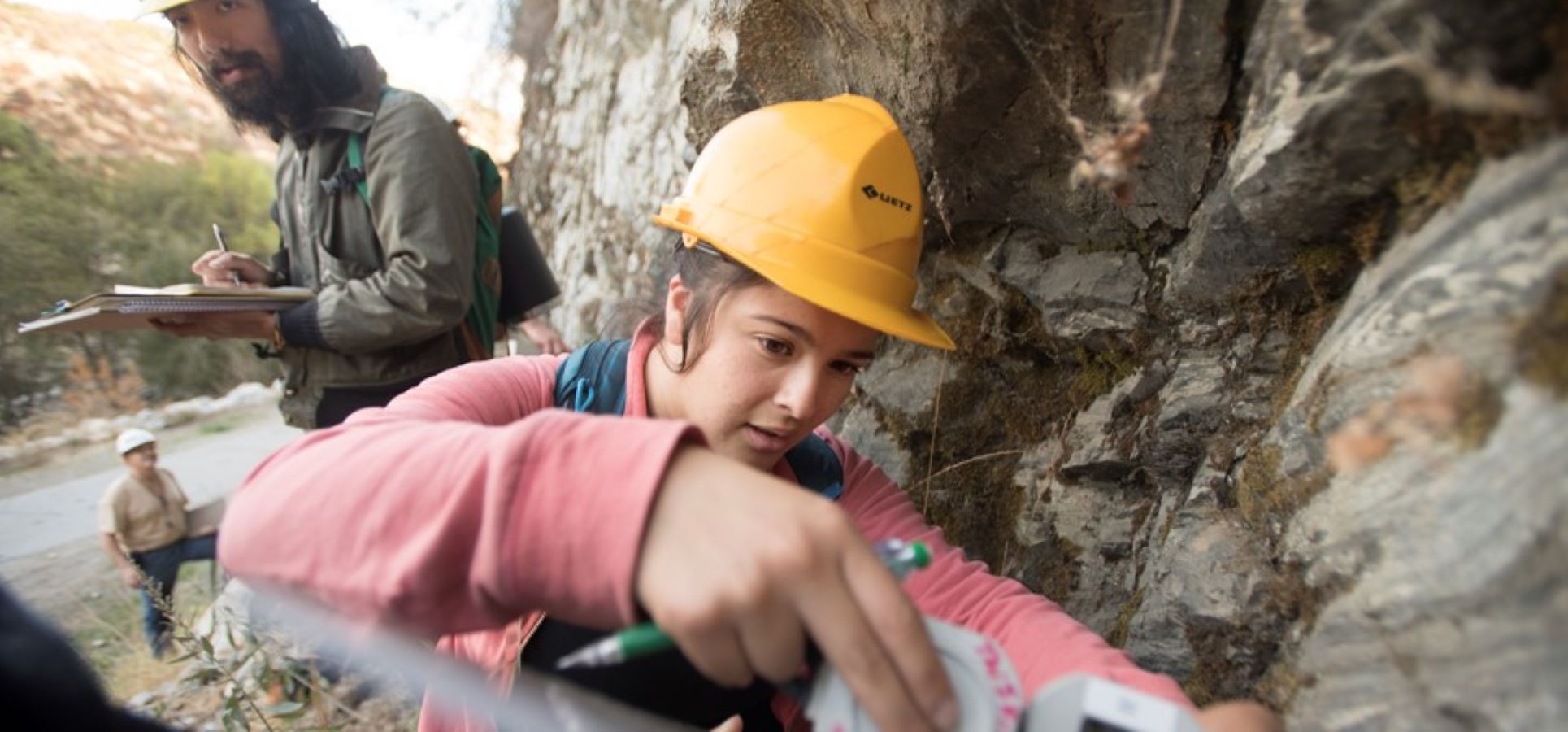 Geology student working in the field