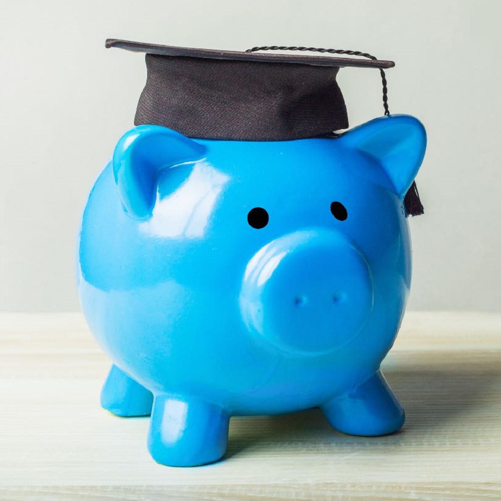 piggy bank with graduation cap