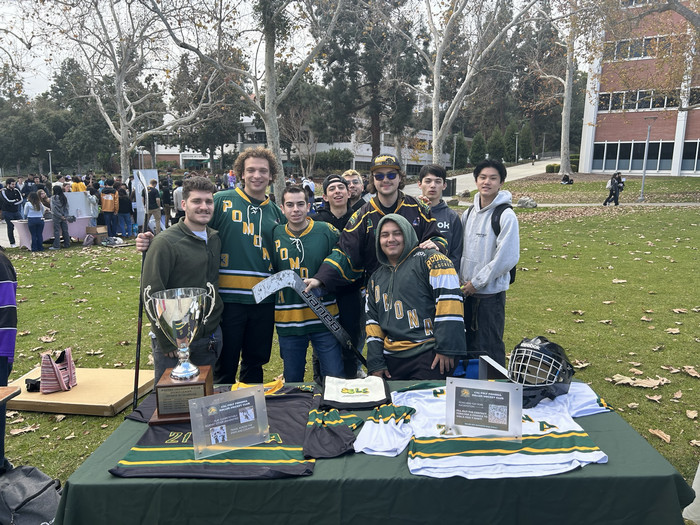 A student hockey club poses for the camera