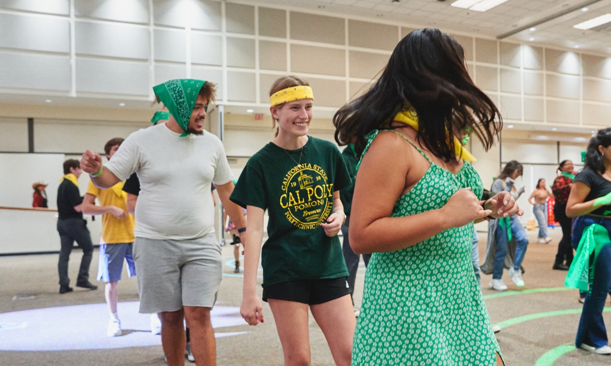 Students practice at a line dance event
