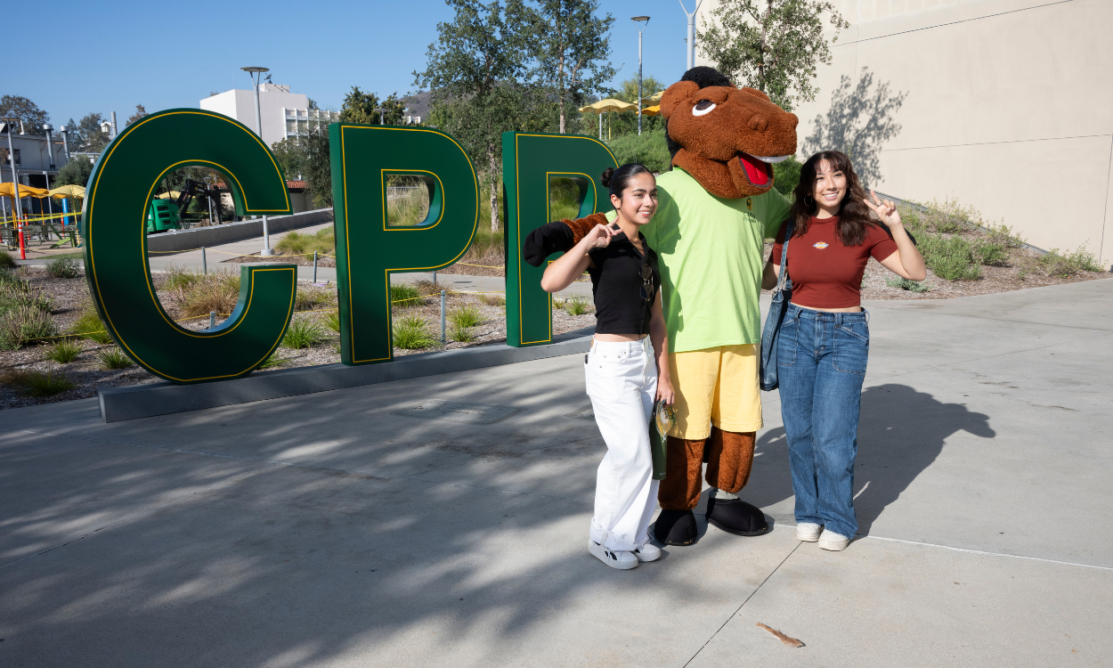 Students pose in front of the large CPP letters