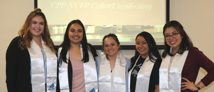 NUFP Students pose during a presentation