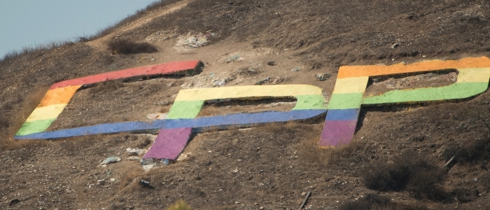 CPP Letters painted with the pride flag colors