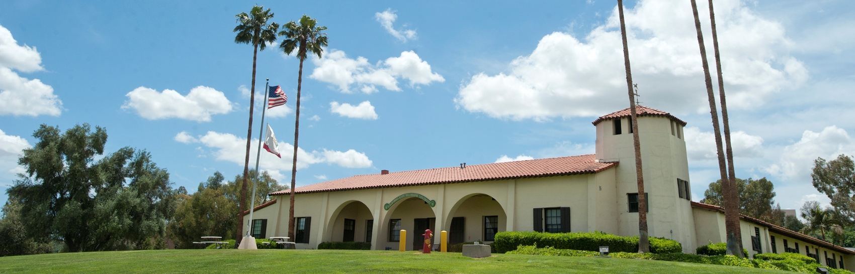 photo of CPP stables with clouds