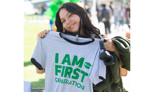 Students with I am First tshirt during First-Gen Week kick off celebration 