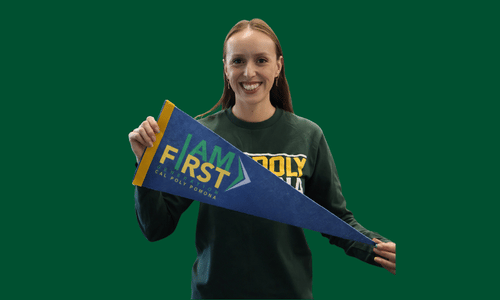 CPP Student holding a I Am First pendent at the I Am First graduation celebration