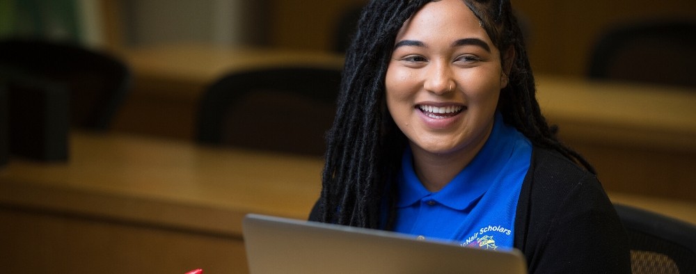 A student uses a laptop in class