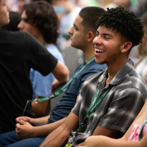 A student smiles at orientation
