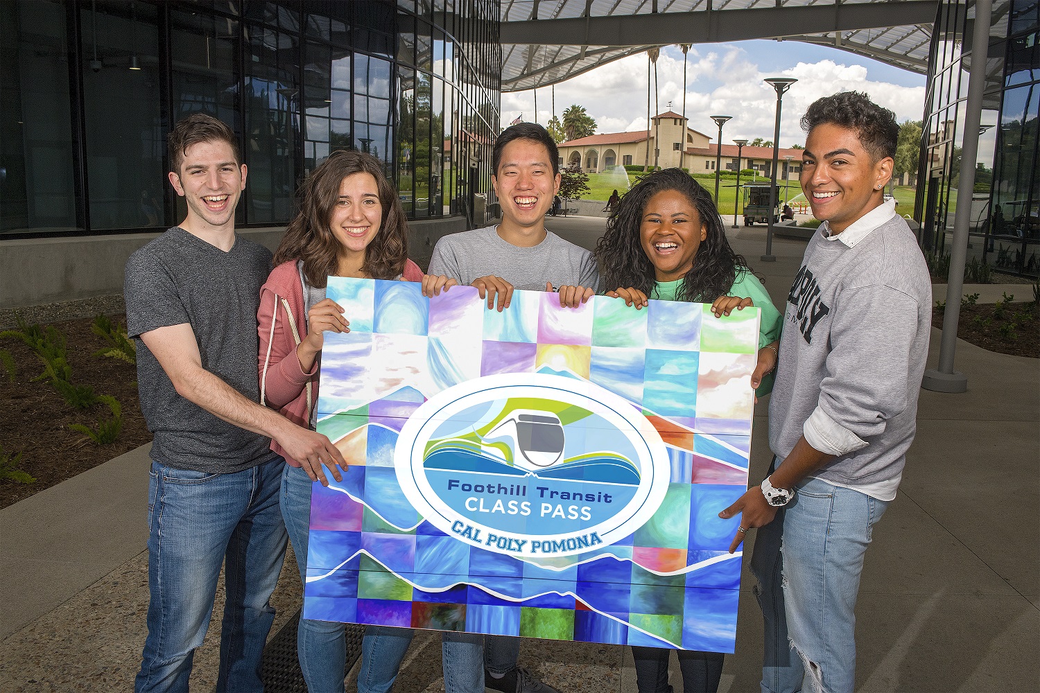 Students hold up a card for Foothill Transit Class Pass