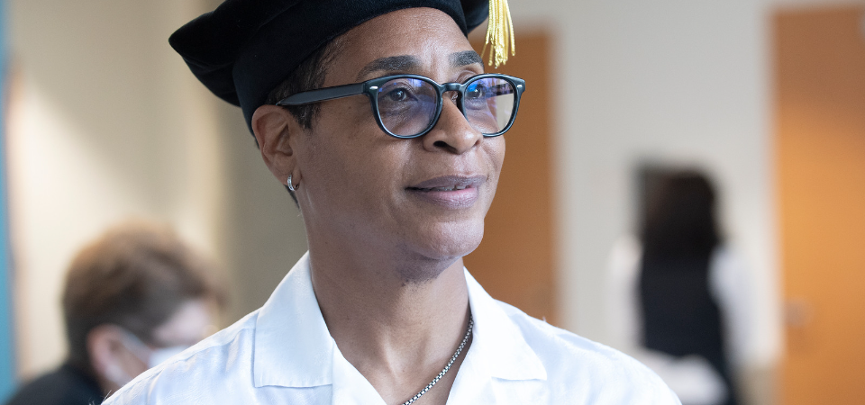Violet Palmer wearing her doctorate cap
