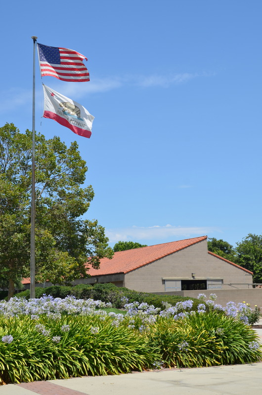 weanling barn with American and California flag