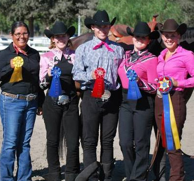 equestrian winners holding their badges icon