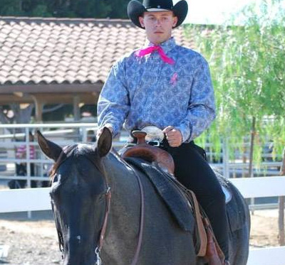 an equestrian man riding horse icon