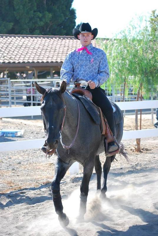 an equestrian man riding horse 