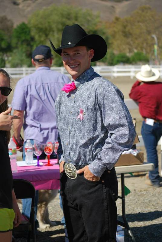 a man posing with his badge