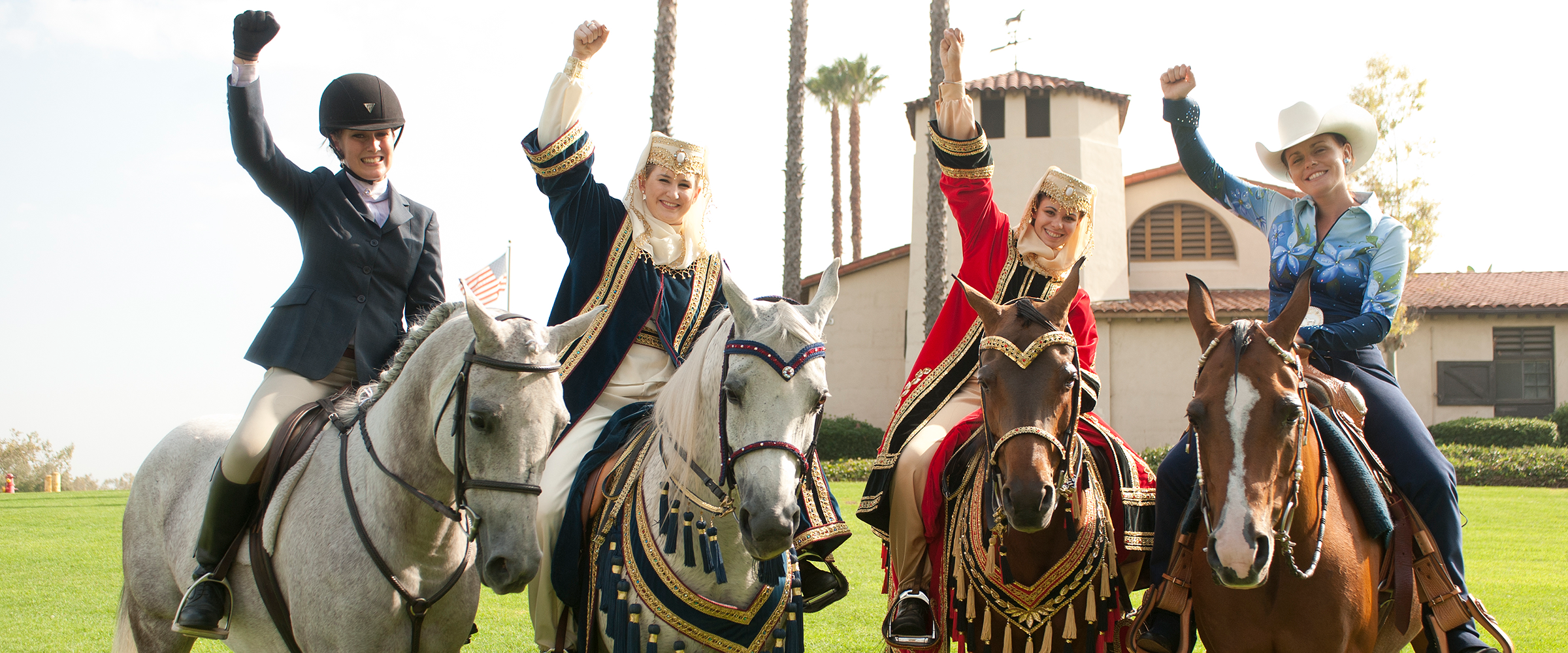 A group of Sunday Show performers in costumes with their Arabian Horses.