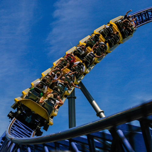 Amusement Parks and Fairs - roller coaster descending from a loop