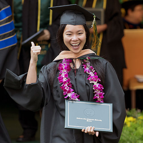 Woman celebrating during Commencement