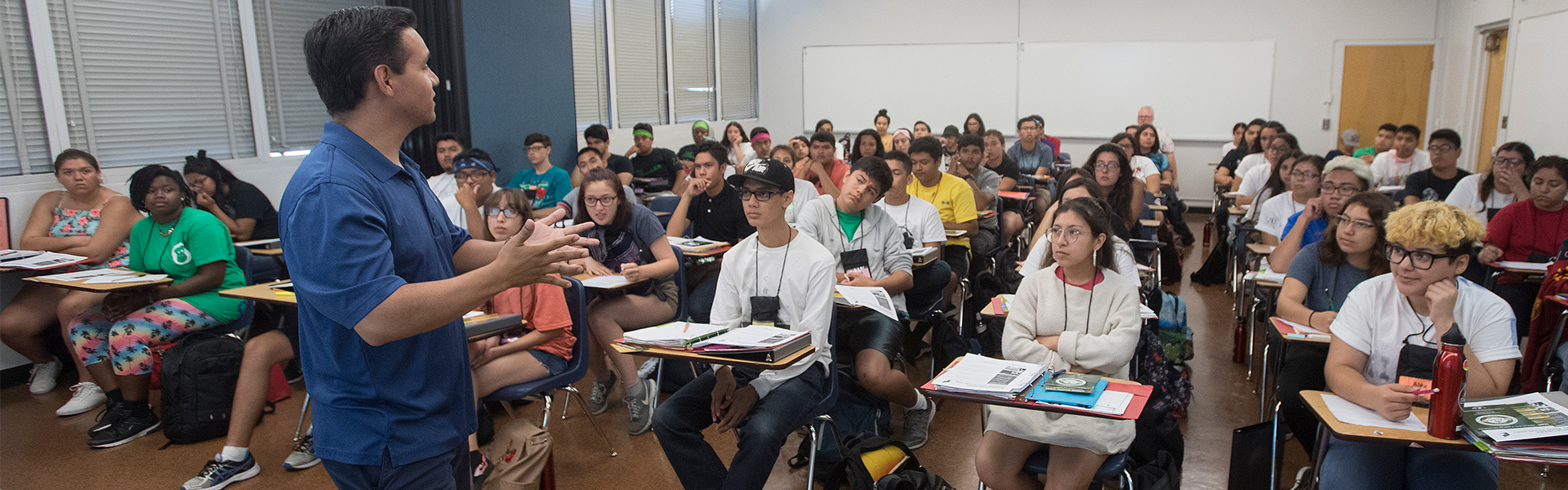During an Upward Bound summer session in 2018, Professor Steve Alas speaks to high school students about opportunities for underrepresented minorities in science.