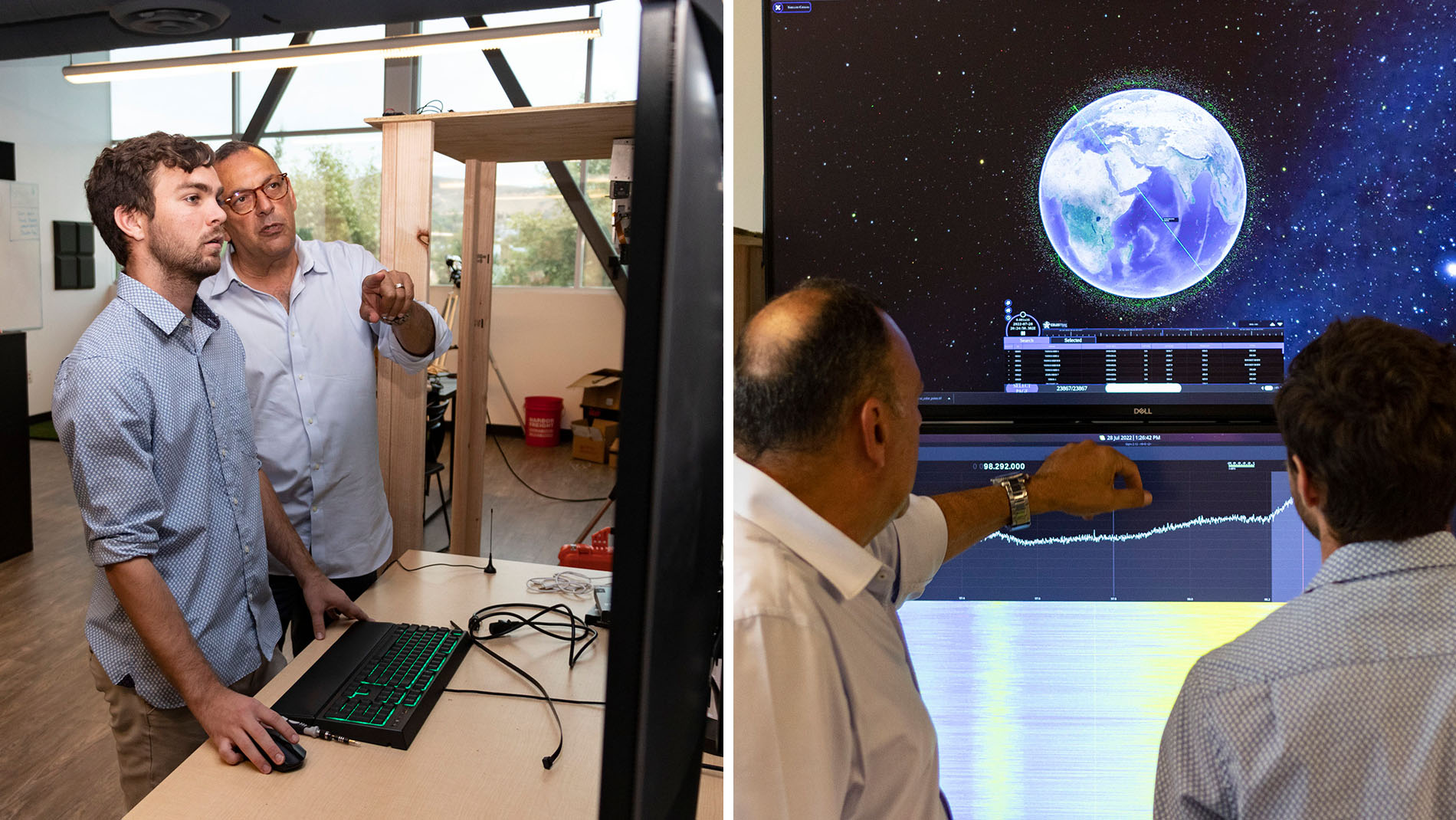 Two men look at a monitor displaying the planet Earth.