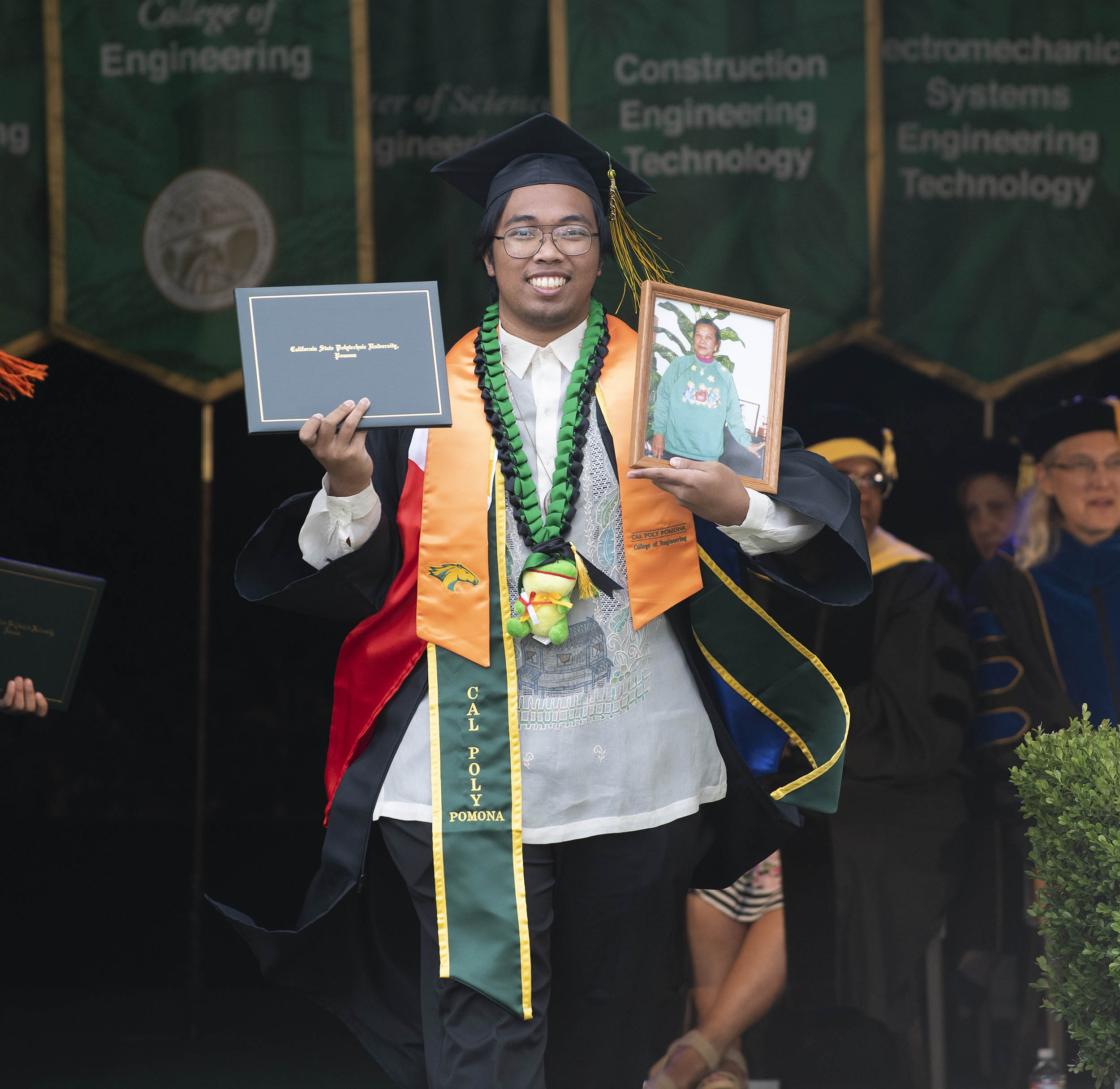 A student celebrating commencement