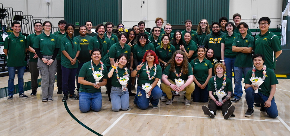 Group Shot of Pep Band with Graduating Seniors in Front