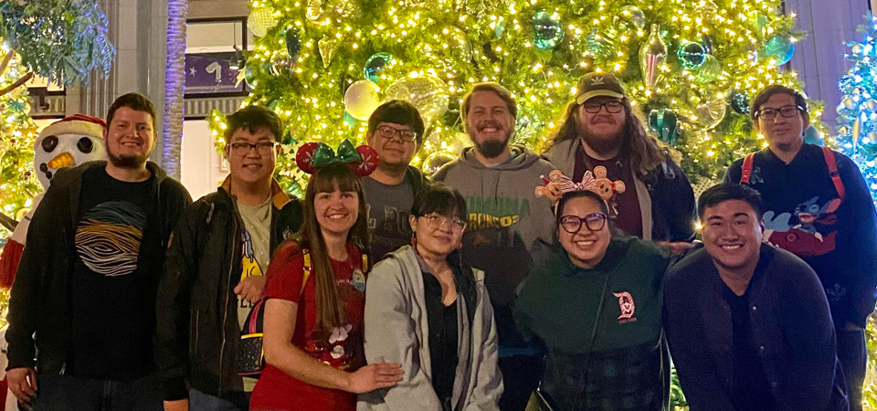 A group of pep band members at downtown Disney during Christmas time