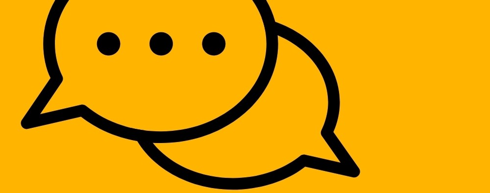 Message bubble icon against a yellow background