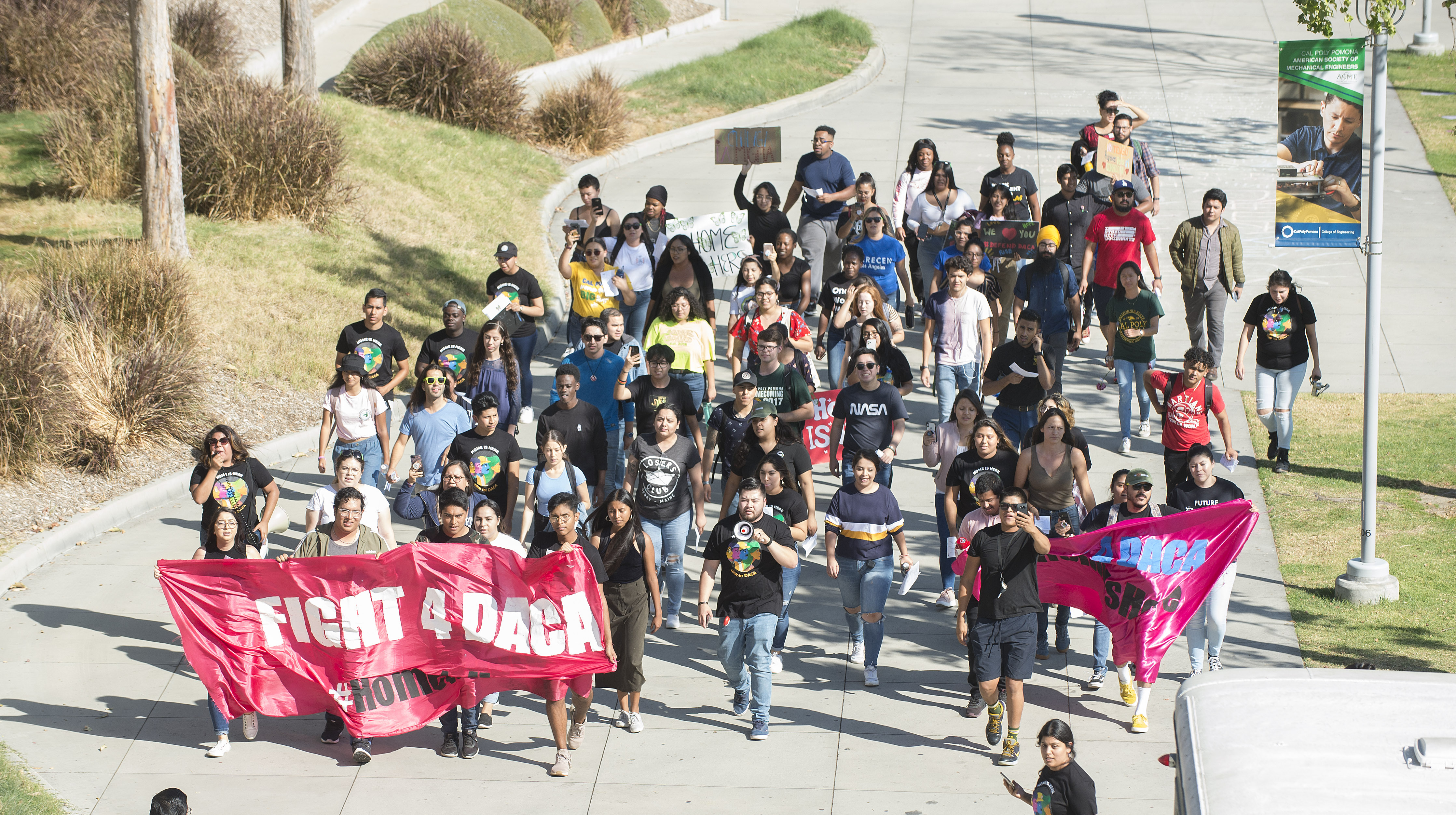 Students march on campus regarding the DACA bill being debated at the Supreme Court
