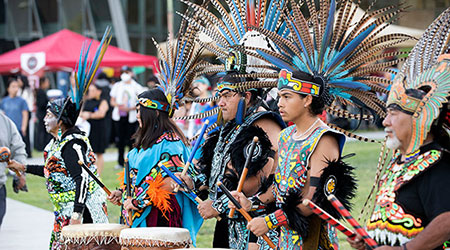 Drummers and dancers during the 2022 Dia De Los Muertos celebration.