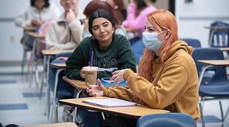 Two female students in class