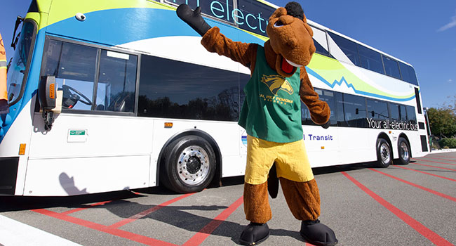 Billy Bronco in front of the Foothill Transit Silver Streak bus.