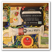 gift box containing crackers, cheeses and meats